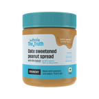 Jar of date sweetened peanut spread with blue lid and label on a white background